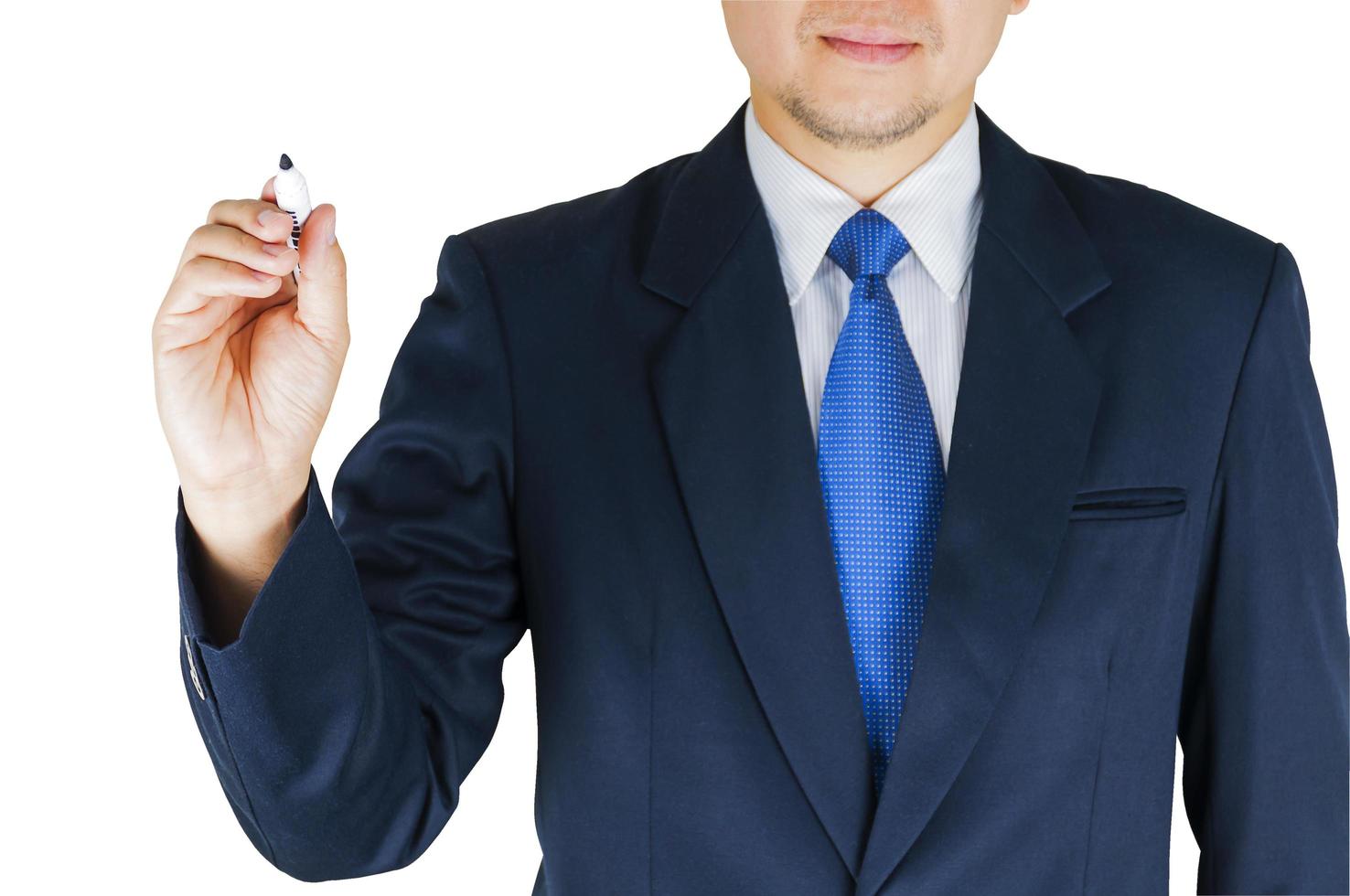 Businessman is showing writing expression holding marker in his hand. Photo is focused at hand and isolated over white.