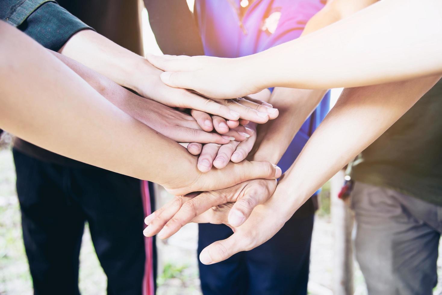 Man touching - holding hand together for success commitment work concept photo