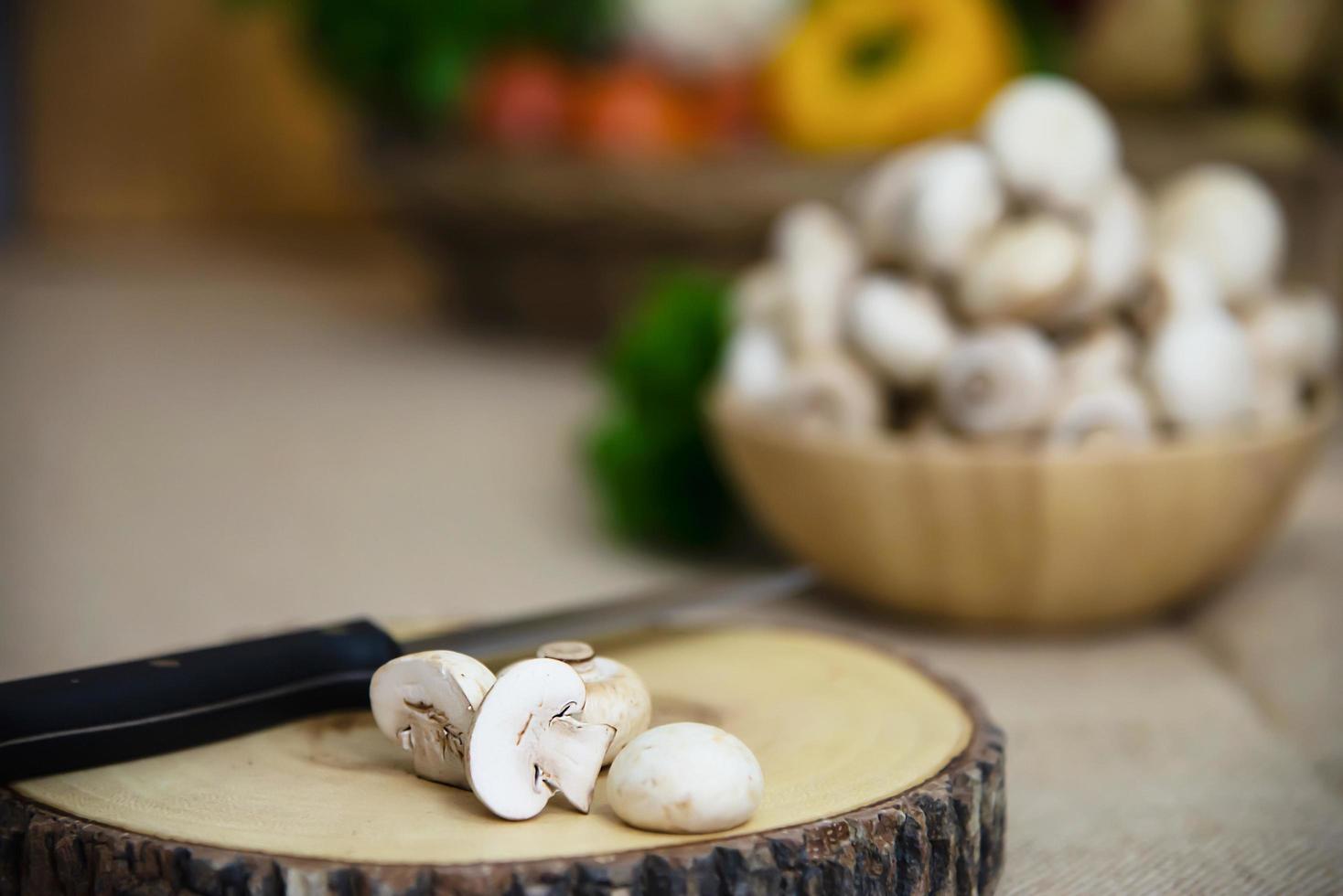 Fresh champignon mushroom vegetable in the kitchen - fresh mushroom vegetable cooking concept photo