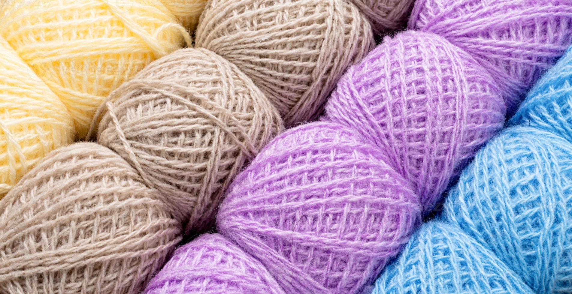 Colorful threads. Selection of colorful yarn wool on shopfront. Knitting  background, a lot of balls. Knitting yarn for handmade winter clothes.  Stock Photo by ©davit85 293143384