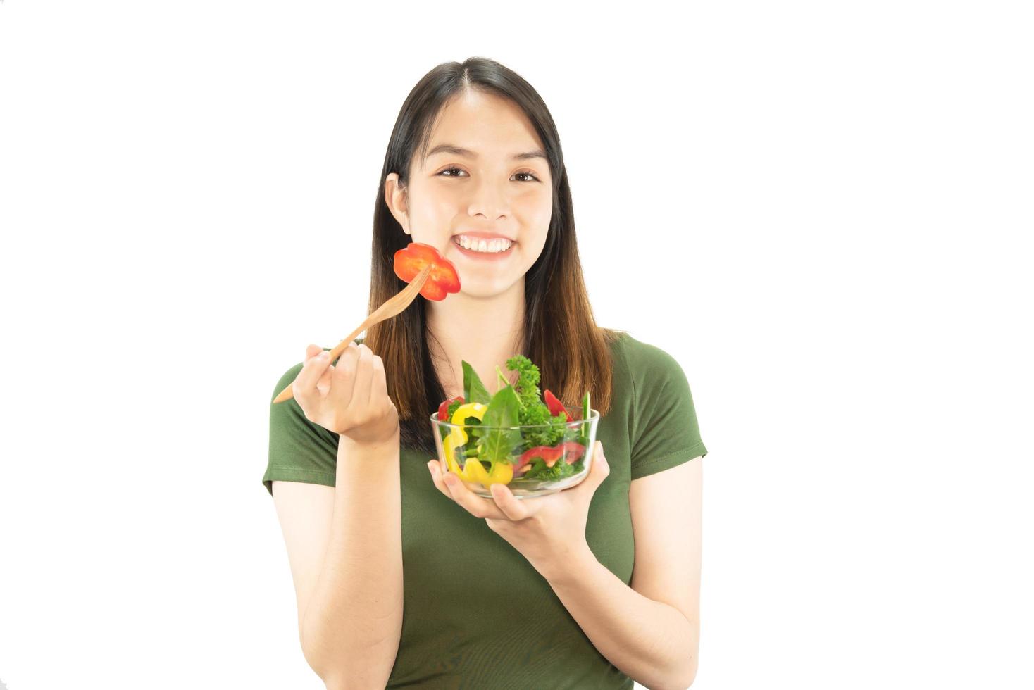 Happy lady holding kichen stuff over copy space background - people home made food preparation concept photo