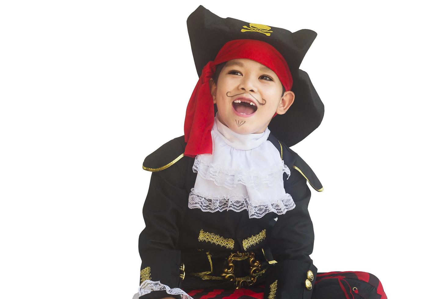 Asian boy smiling in pirate costume isolated over white photo