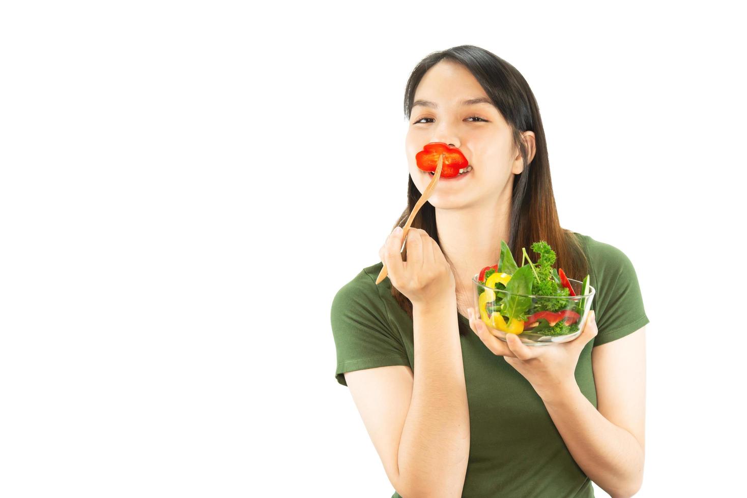 Happy lady holding kichen stuff over copy space background - people home made food preparation concept photo