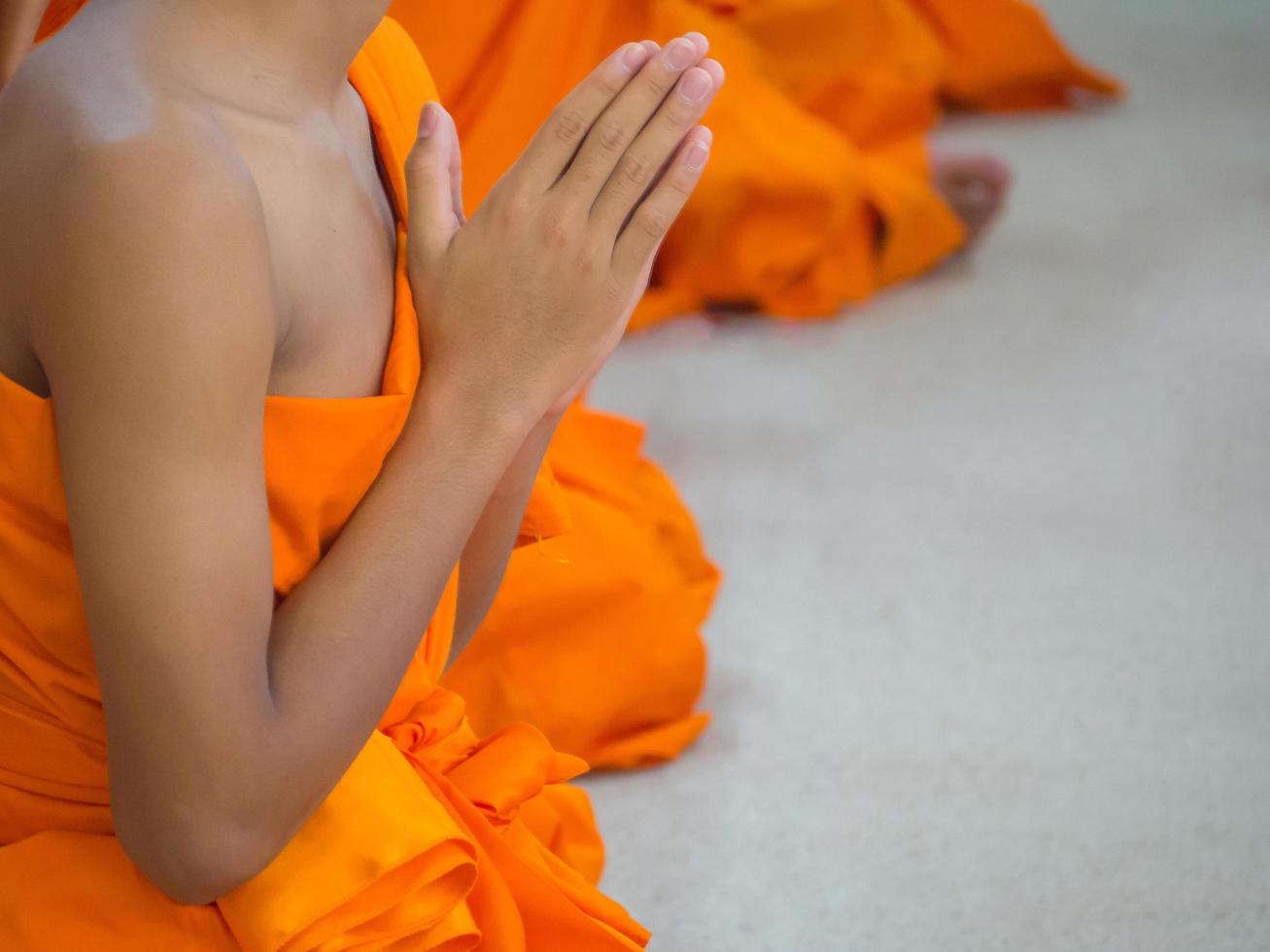 Close-up of novices monk are praying photo
