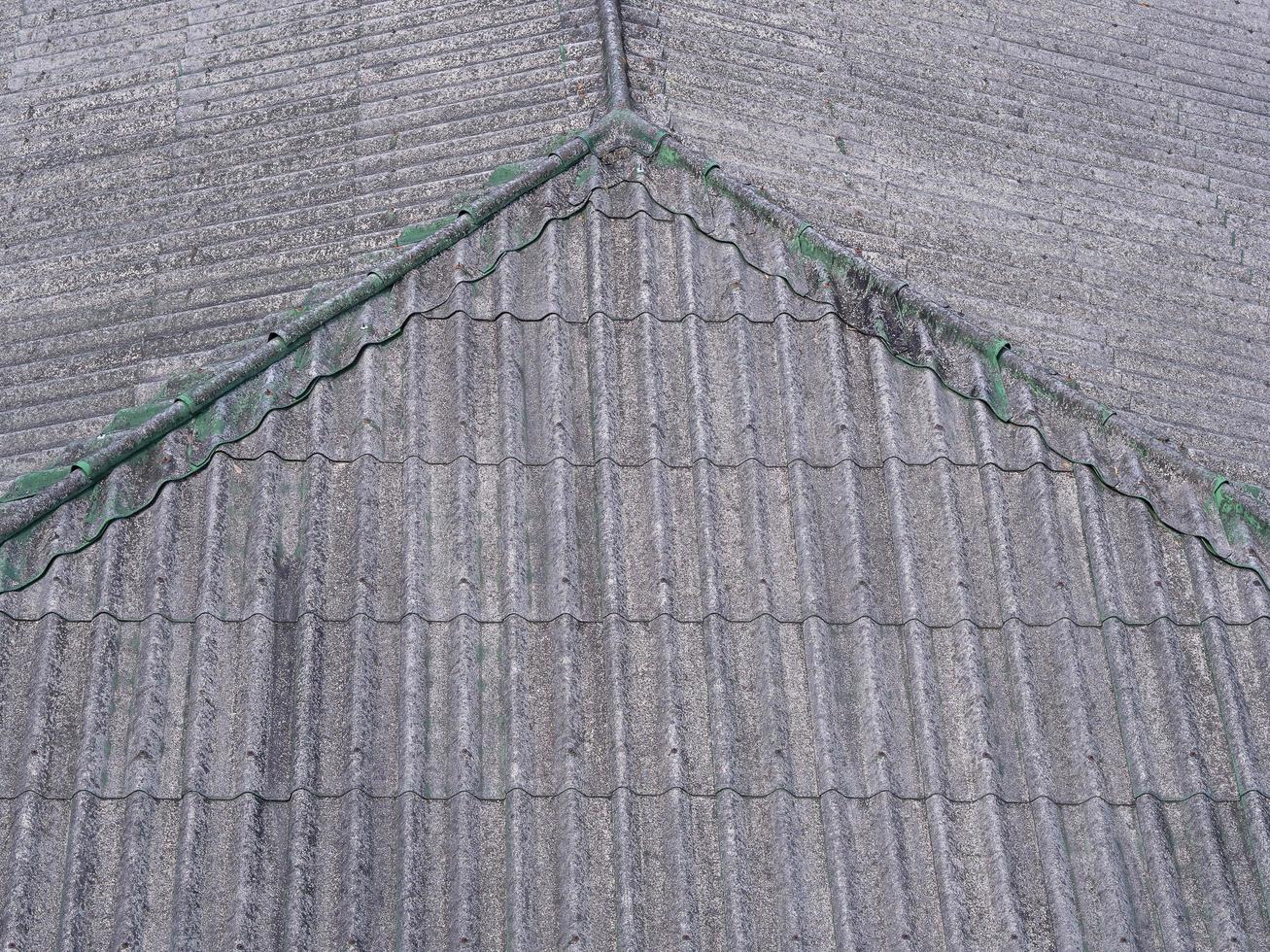 Old slate on the roof of gray color photo