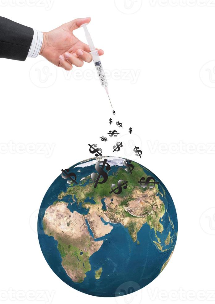 hand holding syringe filled with currency photo
