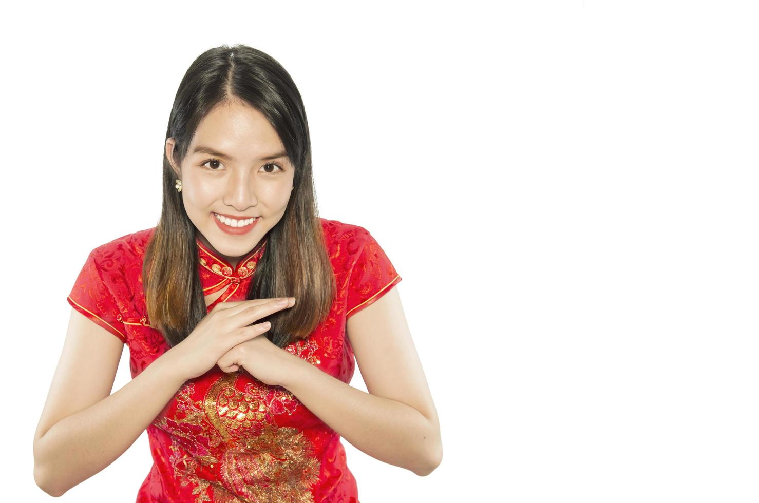 Happy Asian lady in Chinese suite isolated over white copy space - woman day concept photo