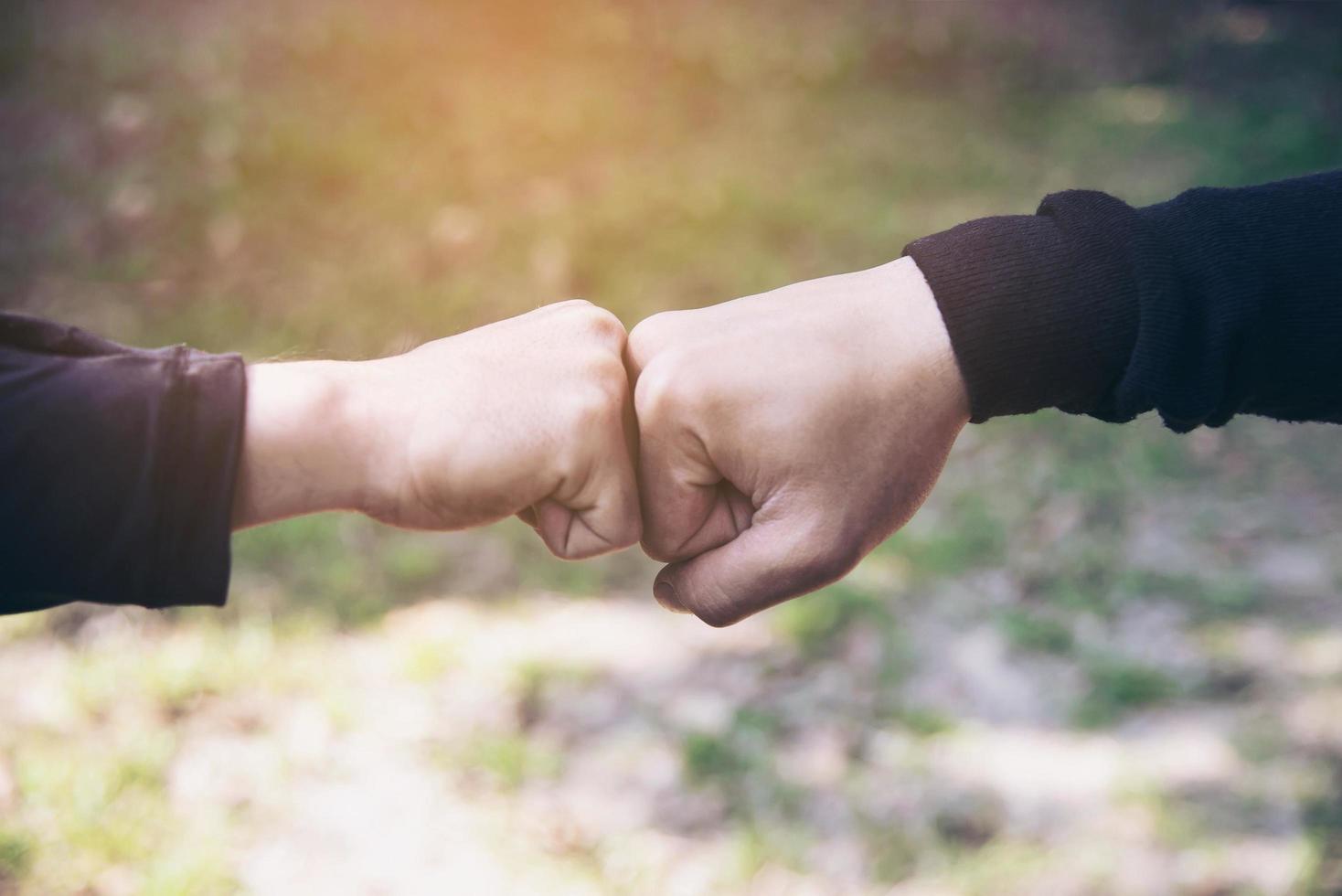 Man touching - holding hand together for success commitment work concept photo