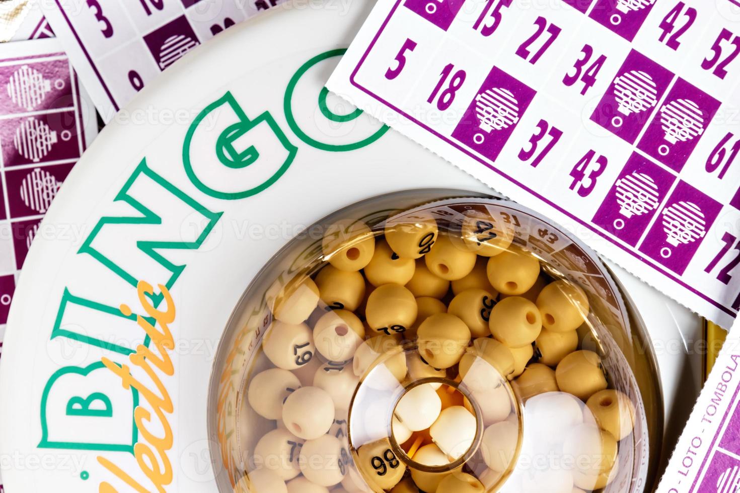 Electronic bingo game with cards to play. Horizontal image viewed from above. photo