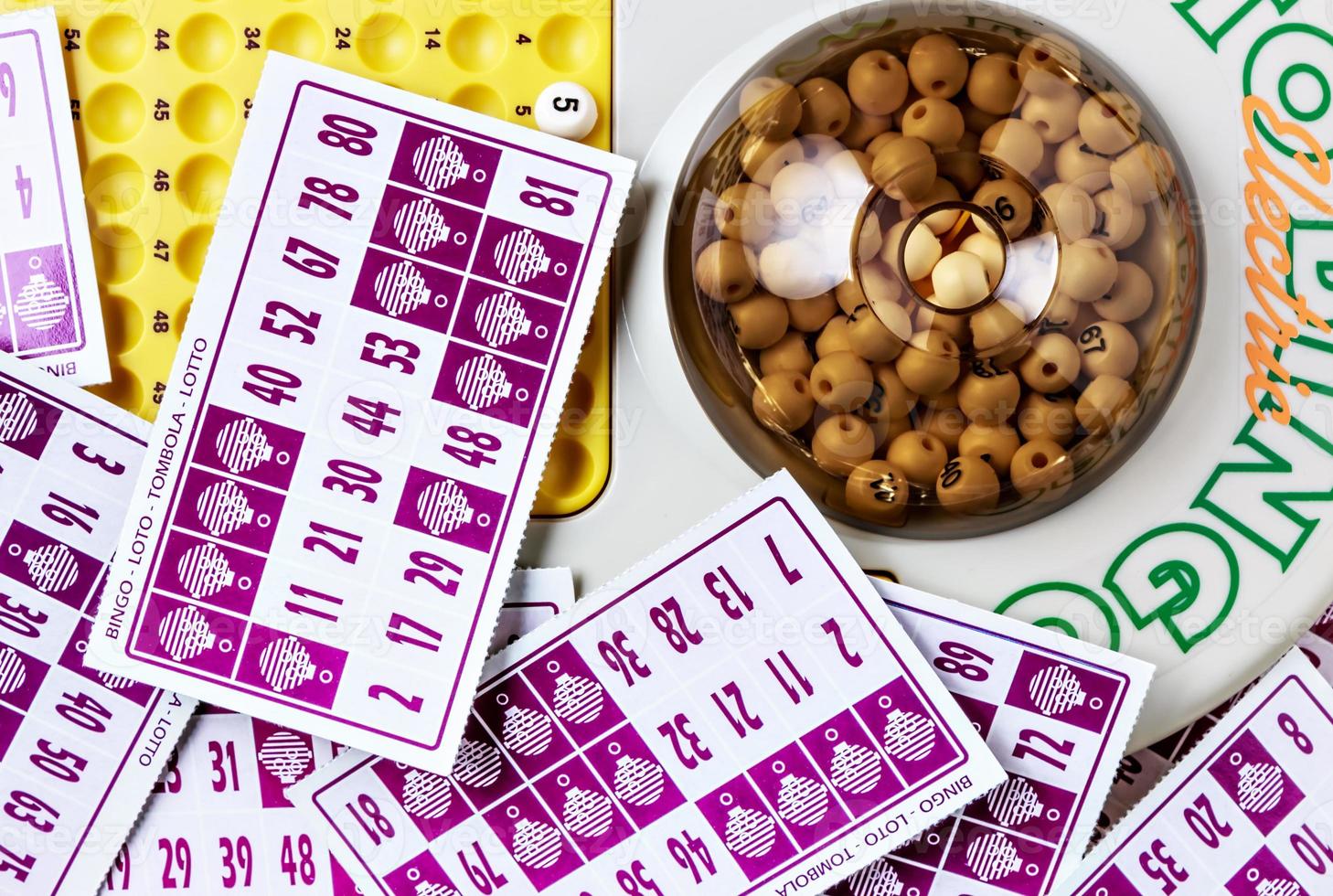 Electronic bingo game with cards to play. Horizontal image viewed from above. photo