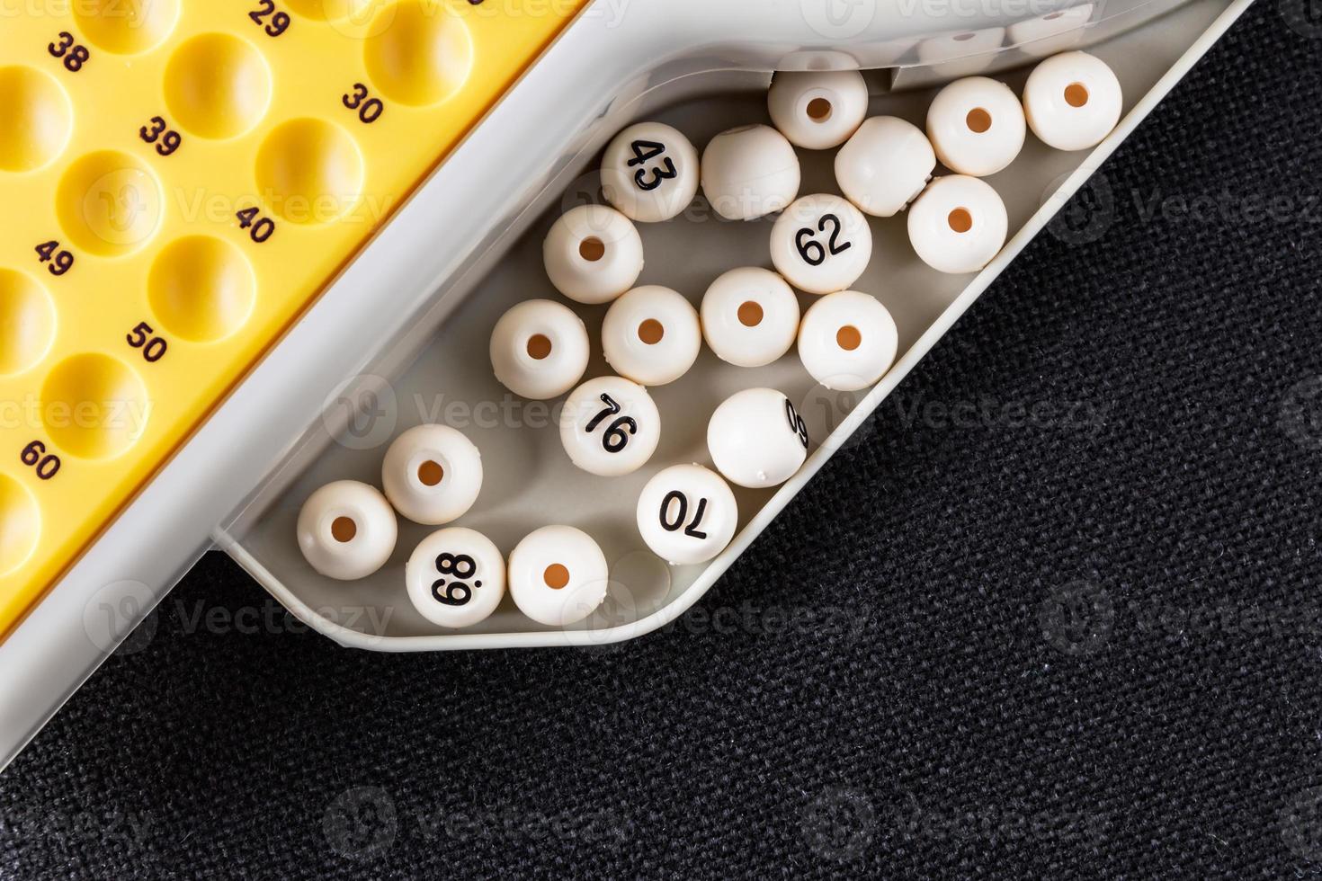 Electronic bingo game with balls to play. Horizontal image viewed from above. photo