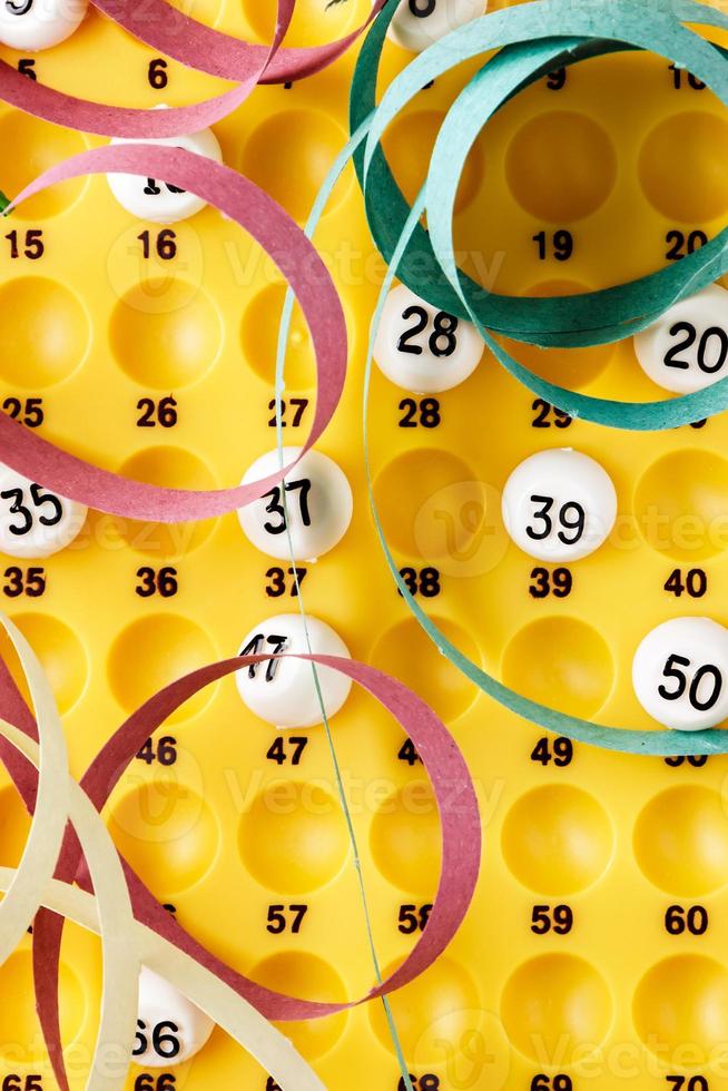 Bingo game with serpentines. Vertical image viewed from above. photo