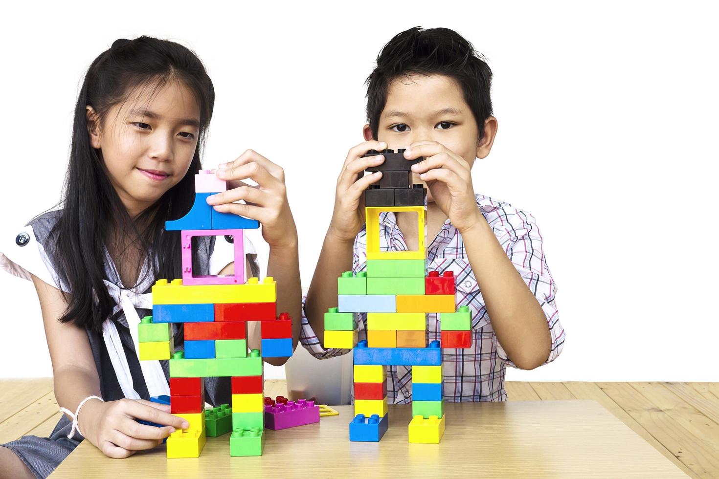 Kids playing pieces plastic creative construction blocks photo