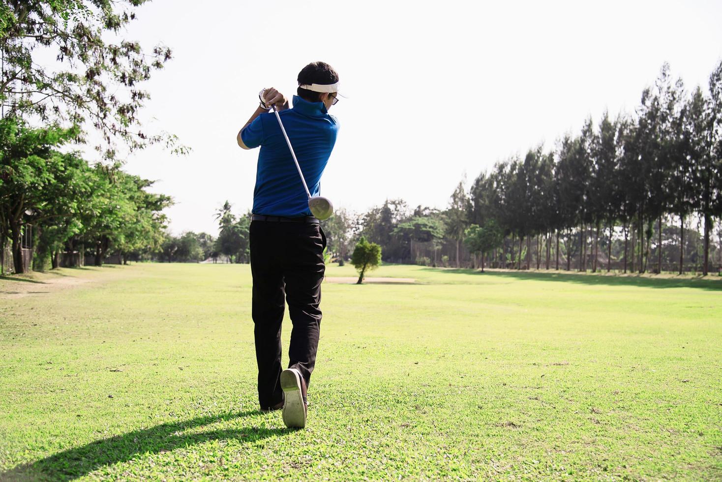 Man play outdoor golf sport activity - people in golf sport concept photo