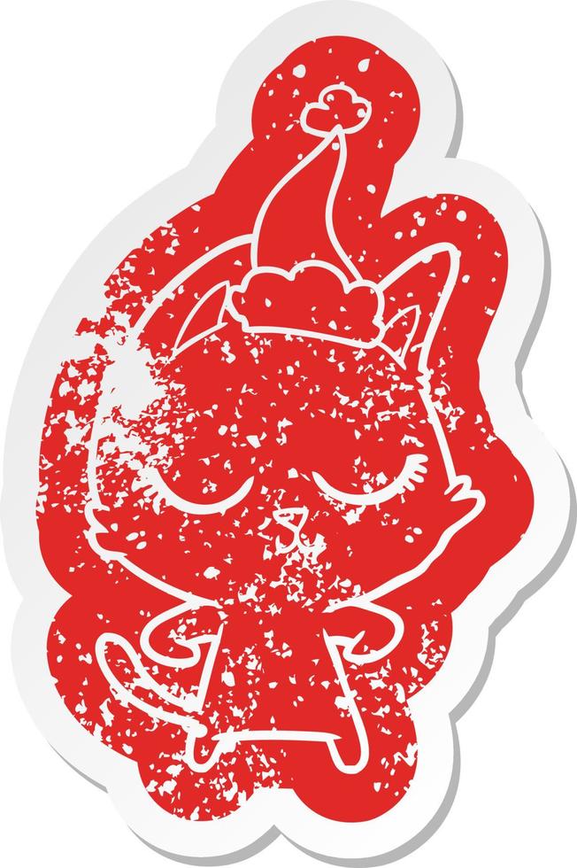 calm cartoon distressed sticker of a cat wearing santa hat vector