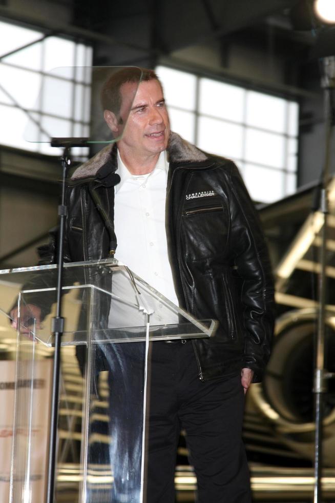 LOS ANGELES, SEP 20 -  John Travolta at the Bombardier Aircraft Event announcing John Travolta as the Spokesperson for Bombardier at Hanger 25, Burbank Airport on September 20, 2011 in Burbank, CA photo