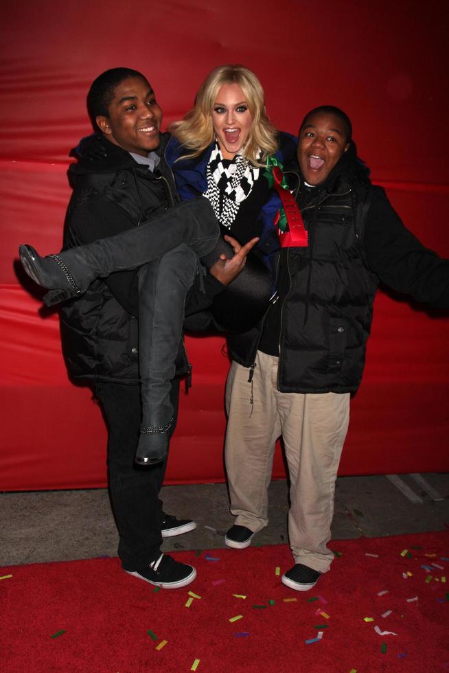 LOS ANGELES, NOV 28 -  Chris Massey, Lacey Schwimmer, Kyle Massey arrives at the 2010 Hollywood Christmas Parade at Hollywood Boulevard on November 28, 2010 in Los Angeles, CA photo