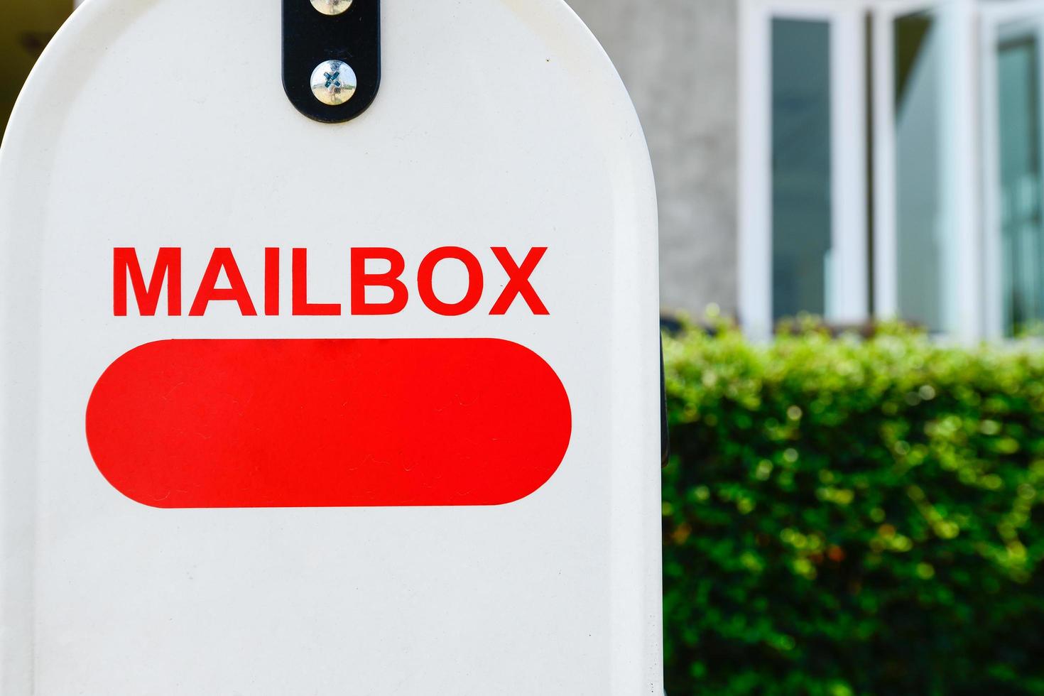 Close up of the mail box or post box is a box outside a person's house where letters are put. photo