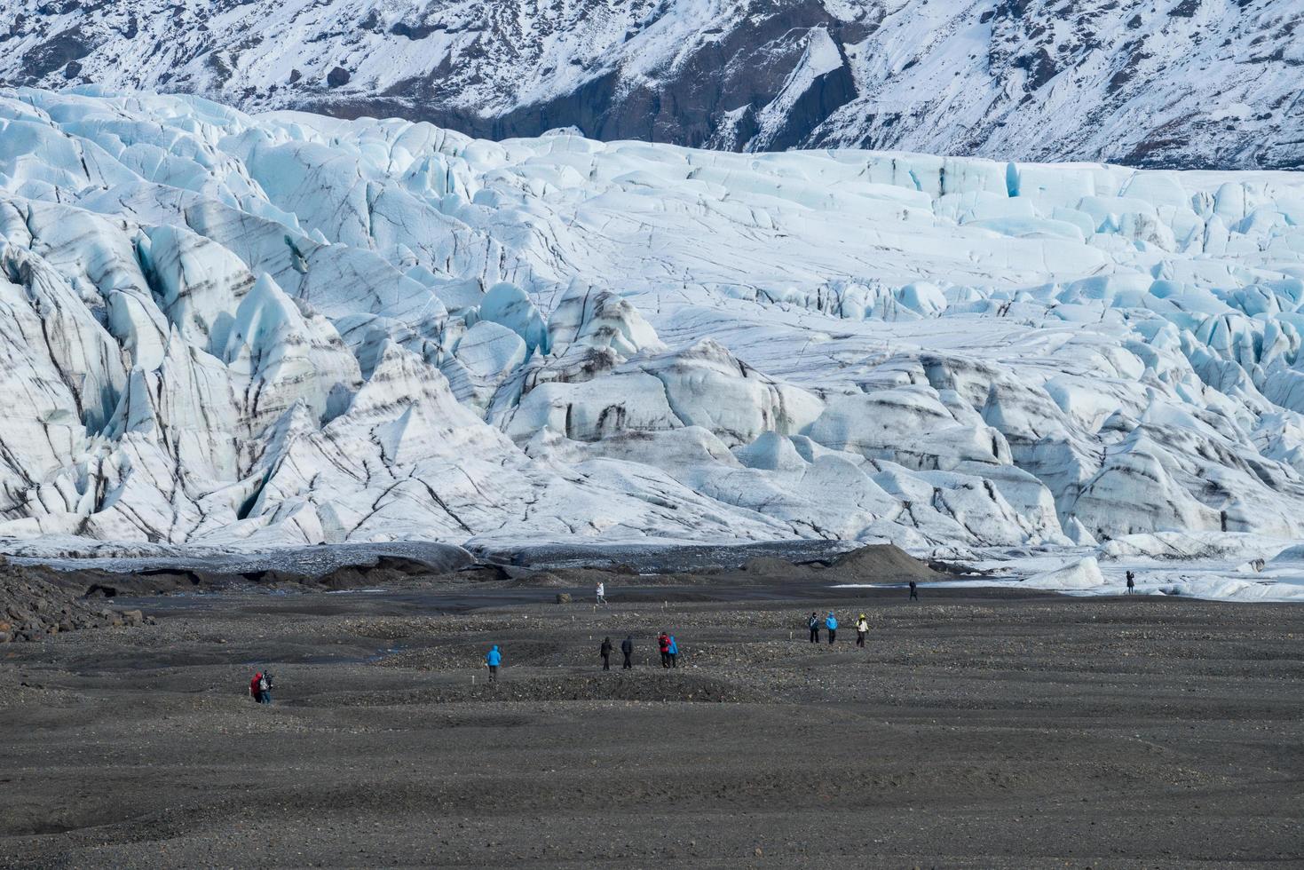 Tourist journey on the glacier of Skaftafell glacier in Vatnajokull national park of south Iceland. photo