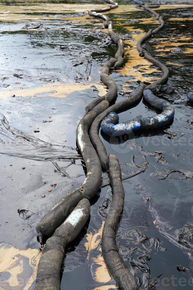 crude oil spill on the beach photo