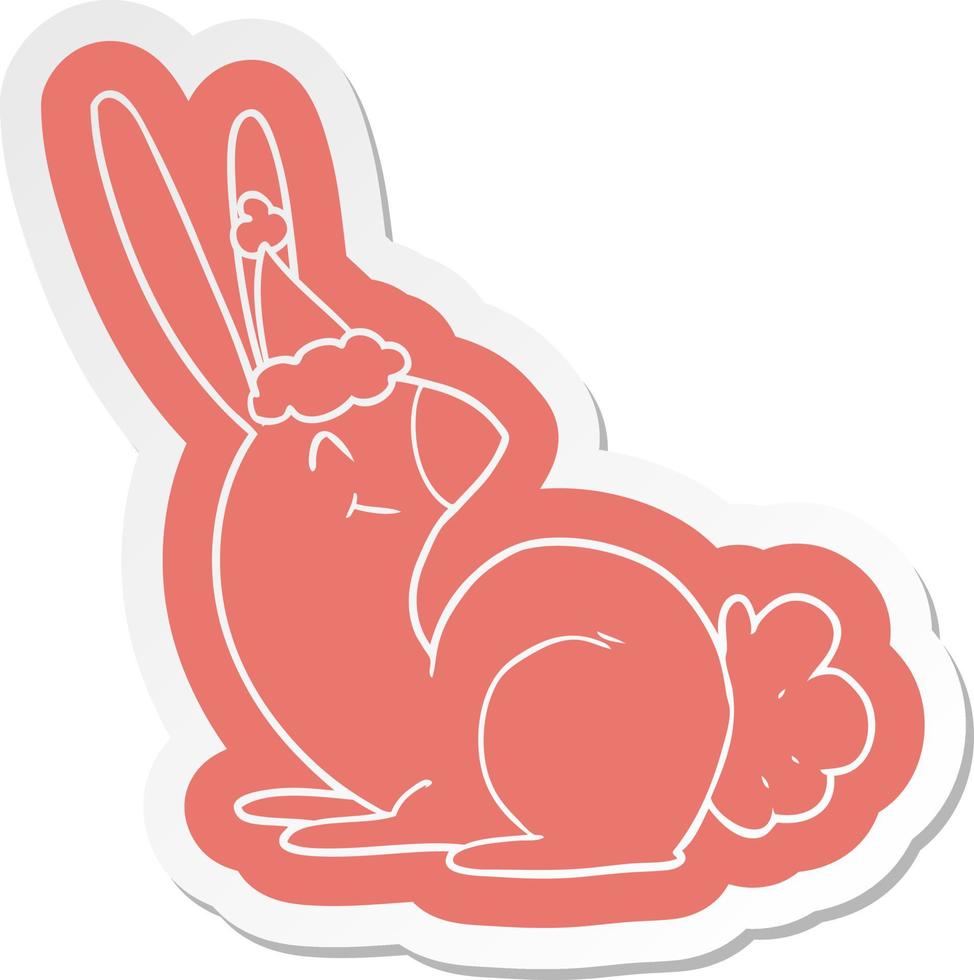 linda pegatina de dibujos animados de un conejo con gorro de Papá Noel  8754794 Vector en Vecteezy