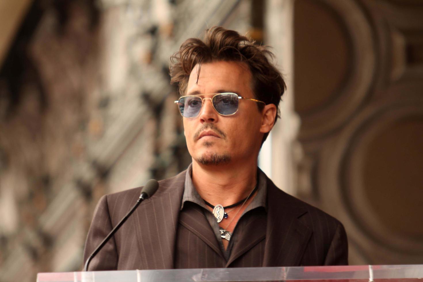 LOS ANGELES, JUN 24 -  Johnny Depp at the Jerry Bruckheimer Star on the Hollywood Walk of Fame at the El Capitan Theater on June 24, 2013 in Los Angeles, CA photo