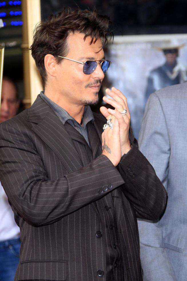 LOS ANGELES, JUN 24 -  Johnny Depp at the Jerry Bruckheimer Star on the Hollywood Walk of Fame at the El Capitan Theater on June 24, 2013 in Los Angeles, CA photo