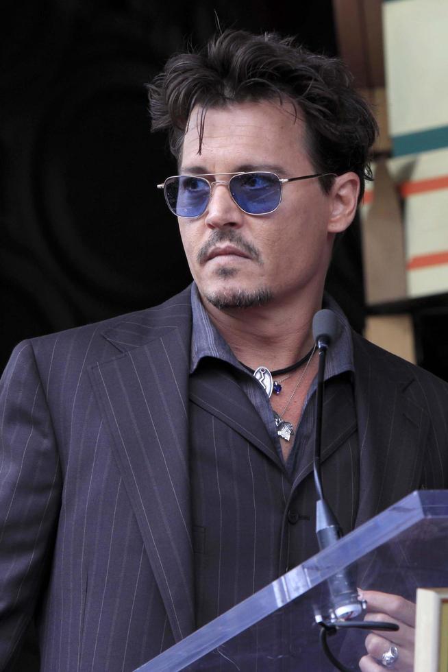 LOS ANGELES, JUN 24 -  Johnny Depp at the Jerry Bruckheimer Star on the Hollywood Walk of Fame at the El Capitan Theater on June 24, 2013 in Los Angeles, CA photo