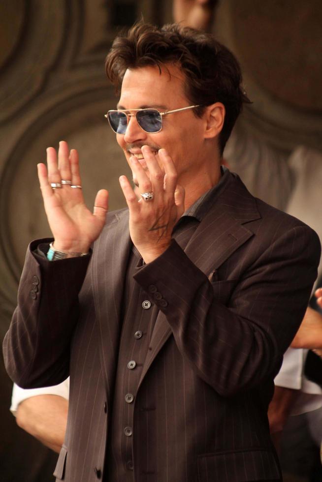 LOS ANGELES, JUN 24 -  Johnny Depp at the Jerry Bruckheimer Star on the Hollywood Walk of Fame at the El Capitan Theater on June 24, 2013 in Los Angeles, CA photo