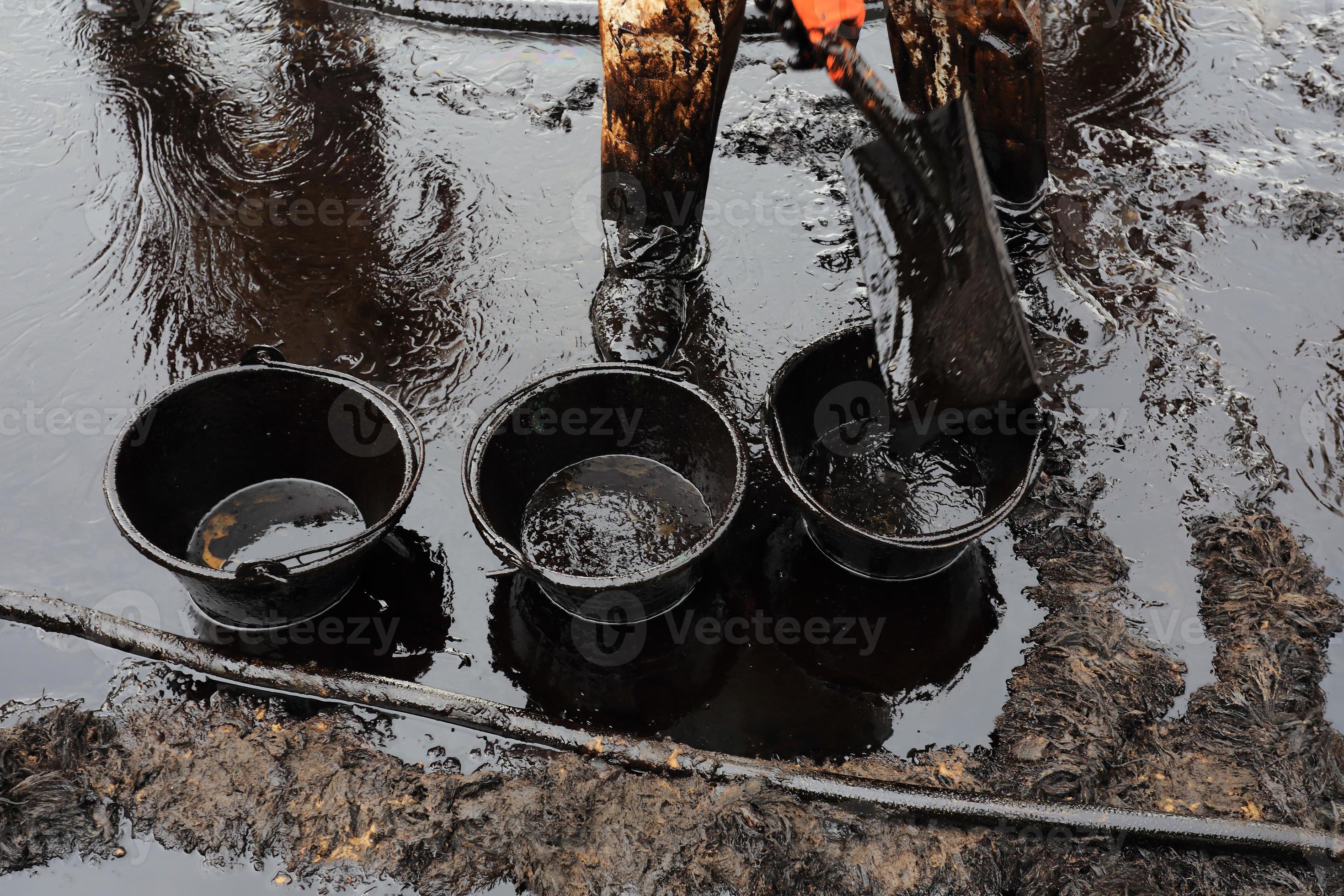 clean up Crude oil stain 8756759 Stock Photo at Vecteezy