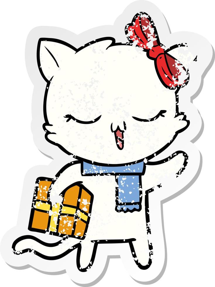 distressed sticker of a cartoon girl cat with christmas present vector