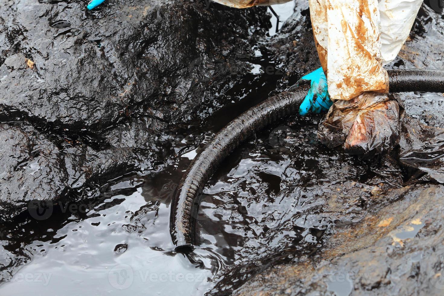 clean up Crude oil stain 8757039 Stock Photo at Vecteezy