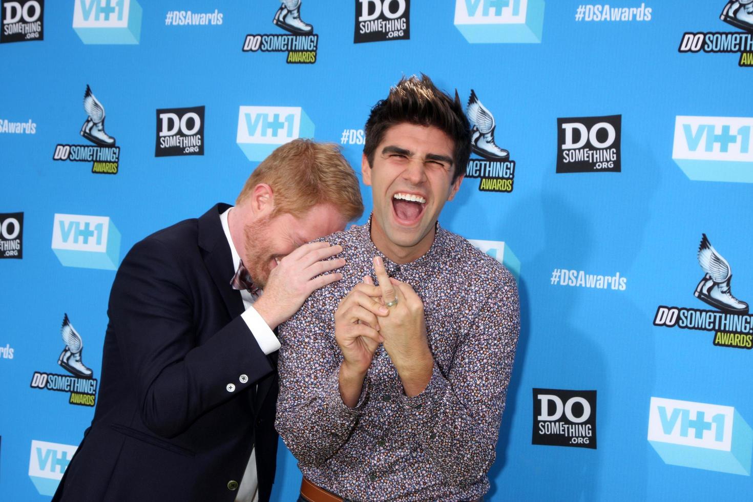 LOS ANGELES, JUL 31 -  Jesse Tyler Ferguson, Justin Mikita arrives at the 2013 Do Something Awards at the Avalon on July 31, 2013 in Los Angeles, CA photo