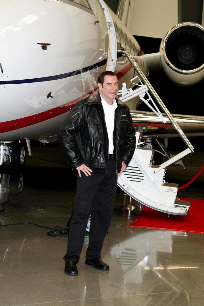 LOS ANGELES, SEP 20 -  John Travolta at the Bombardier Aircraft Event announcing John Travolta as the Spokesperson for Bombardier at Hanger 25, Burbank Airport on September 20, 2011 in Burbank, CA photo