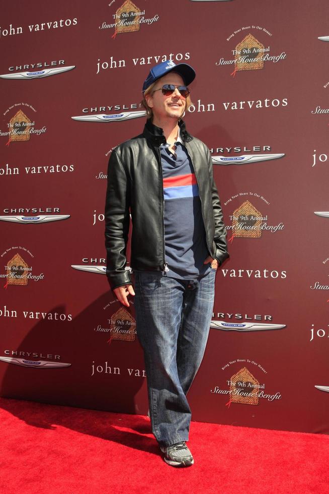 LOS ANGELES, MAR 11 -  David Spade arrives at the 9th Annual John Varvatos Stuart House Benefit at the John Varvatos Store on March 11, 2012 in West Hollywood, CA photo