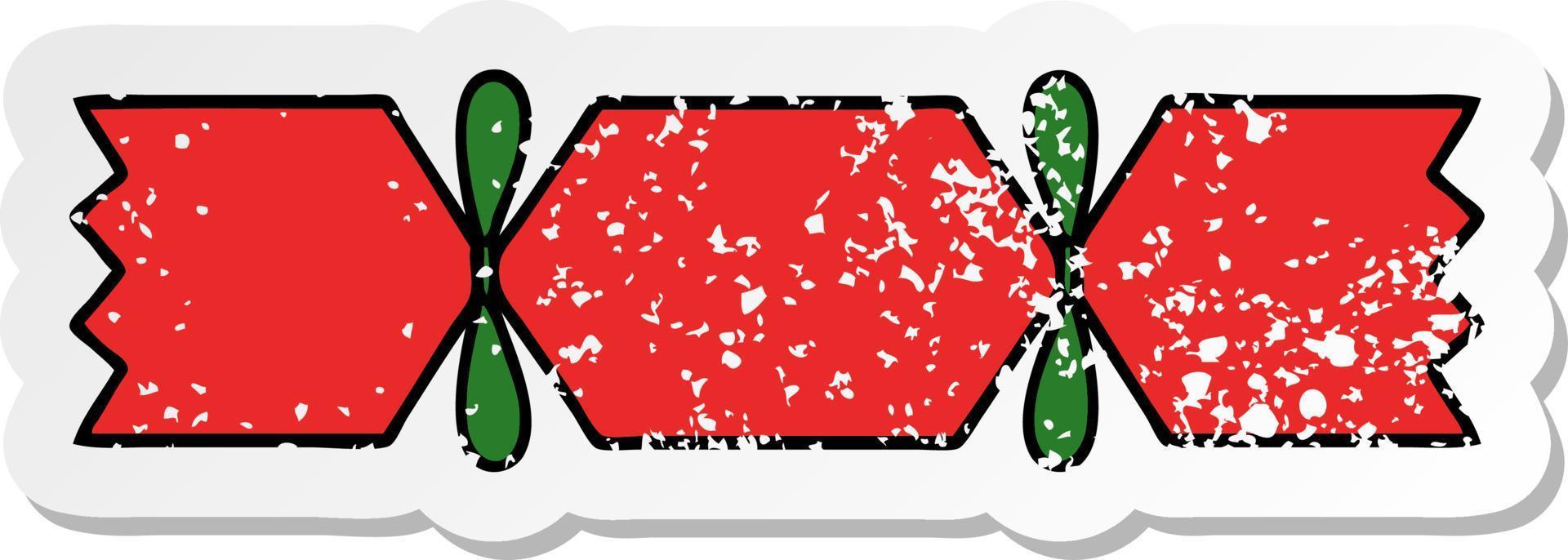 distressed sticker of a cute cartoon christmas cracker vector