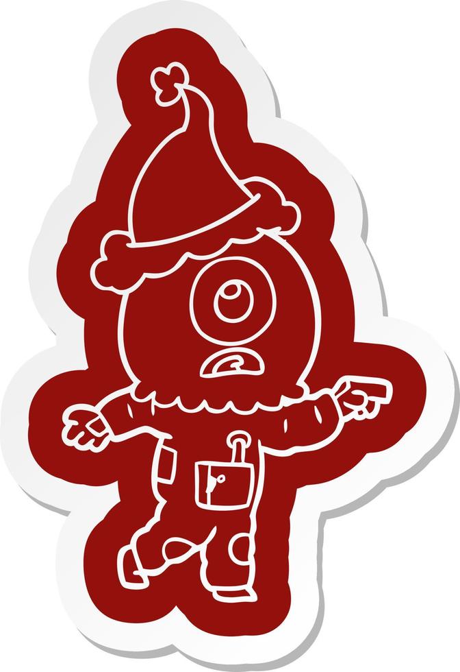 cartoon  sticker of a cyclops alien spaceman pointing wearing santa hat vector