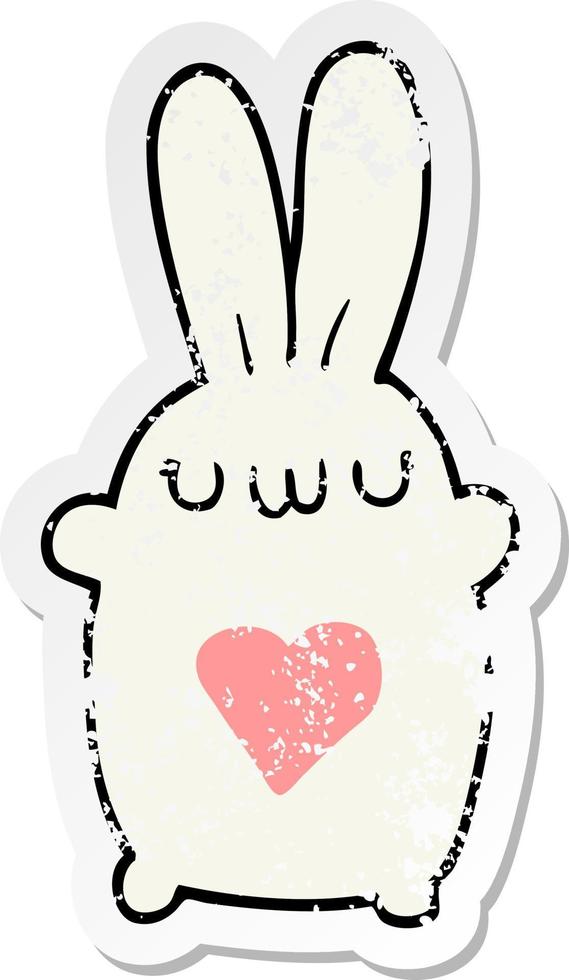 distressed sticker of a cute cartoon rabbit with love heart vector