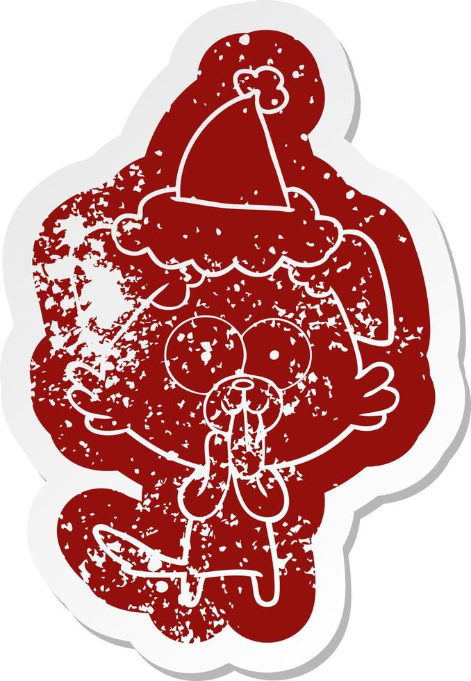 cartoon distressed sticker of a dog with tongue sticking out wearing santa hat vector