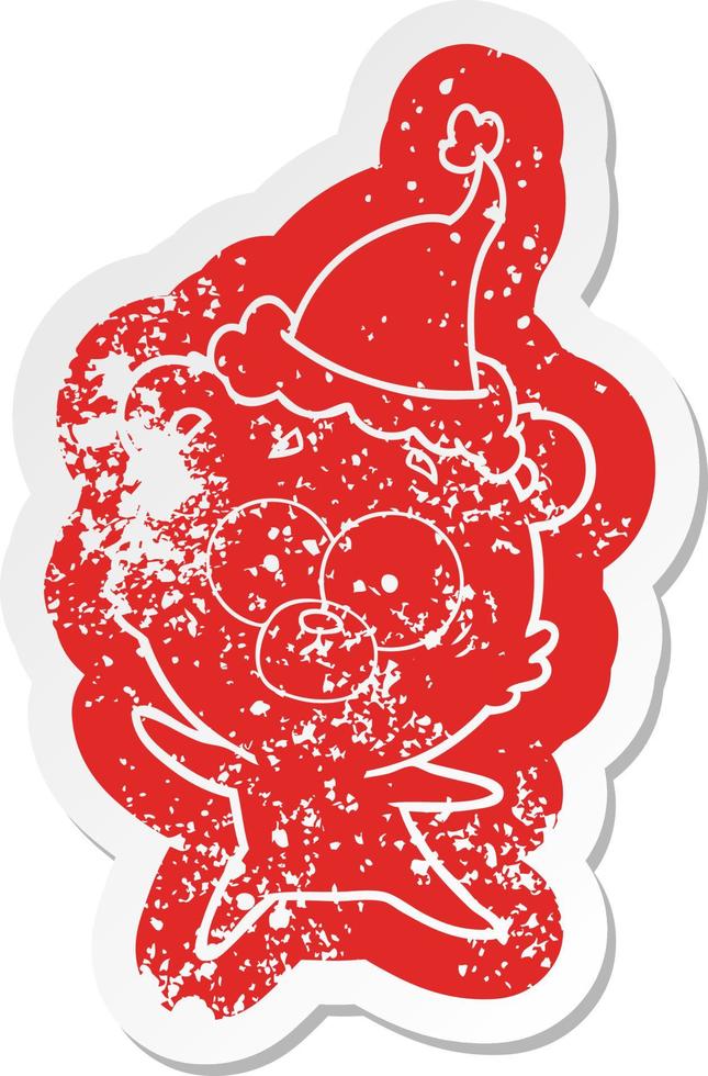 anxious bear cartoon distressed sticker of a wearing santa hat vector