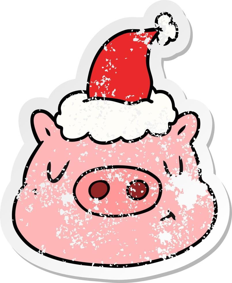 distressed sticker cartoon of a pig face wearing santa hat vector
