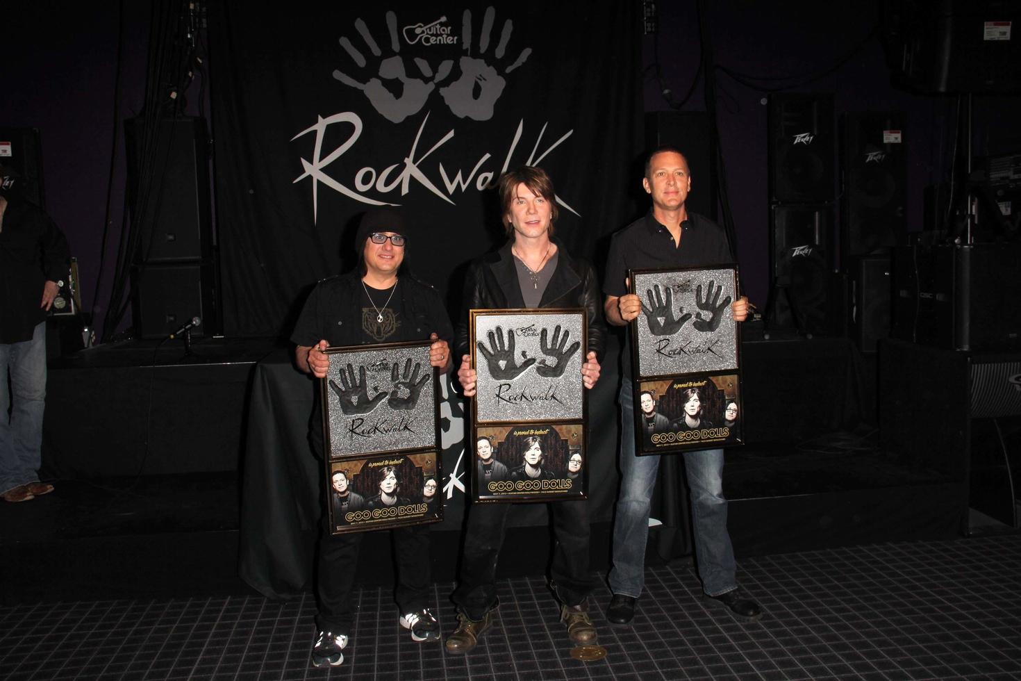 LOS ANGELES, MAY 7 -  Robby Takac, John Rzeznik, Mike Malinin at the Goo Goo Dolls RockWalk Induction at the Paley Center For Media on May 7, 2013 in Beverly Hills, CA photo