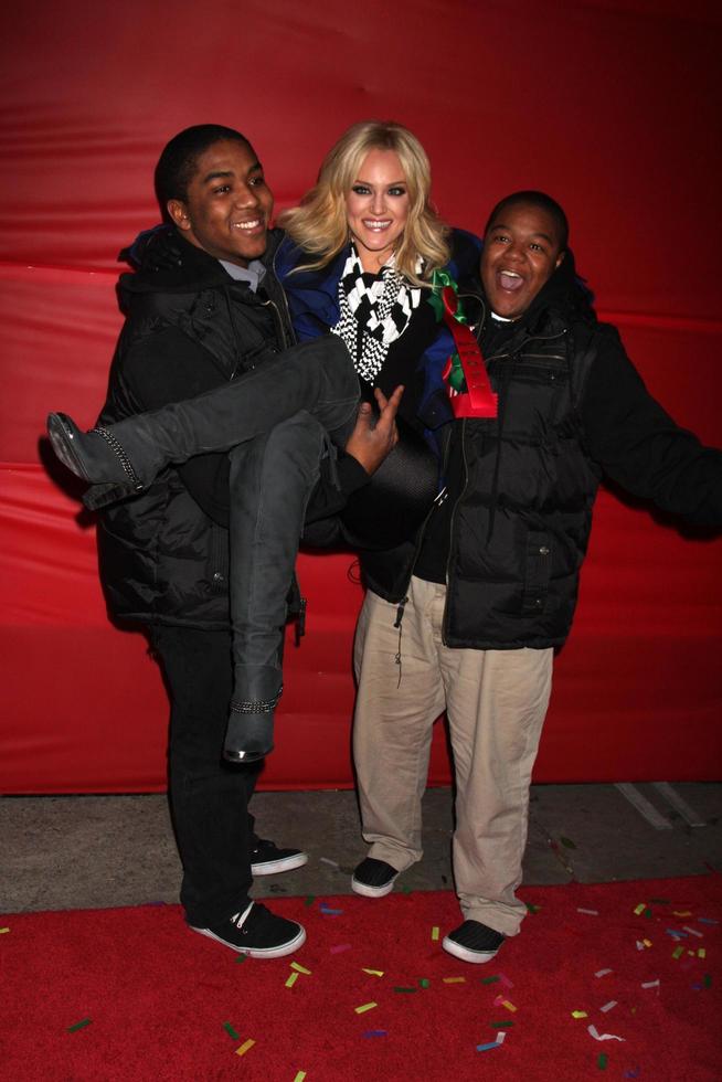 LOS ANGELES, NOV 28 -  Chris Massey, Lacey Schwimmer, Kyle Massey arrives at the 2010 Hollywood Christmas Parade at Hollywood Boulevard on November 28, 2010 in Los Angeles, CA photo