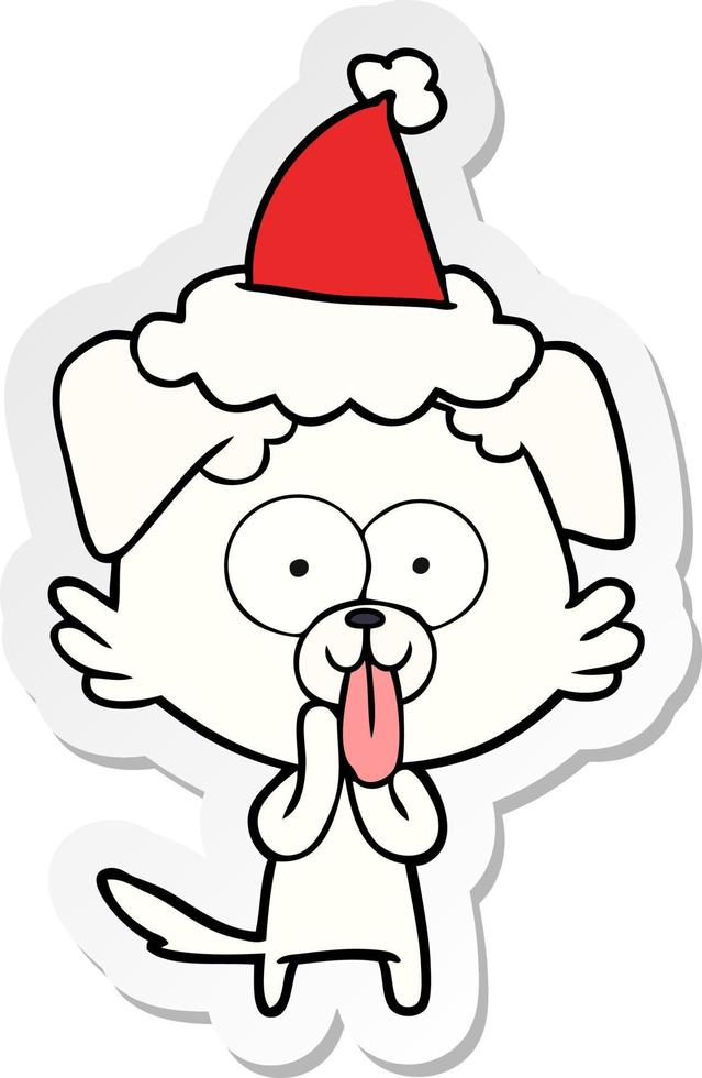 sticker cartoon of a dog with tongue sticking out wearing santa hat vector
