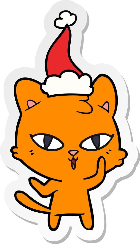 sticker cartoon of a cat wearing santa hat vector
