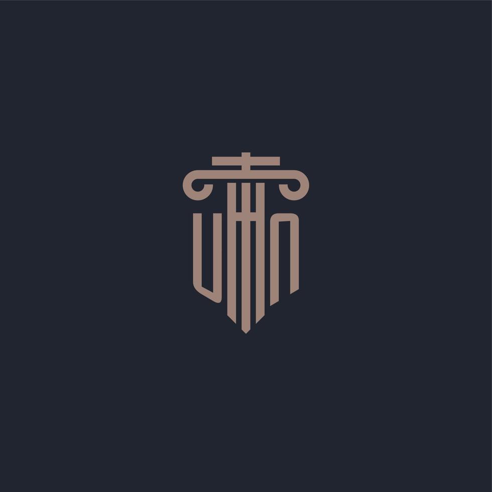 UN initial logo monogram with pillar style design for law firm and justice company vector