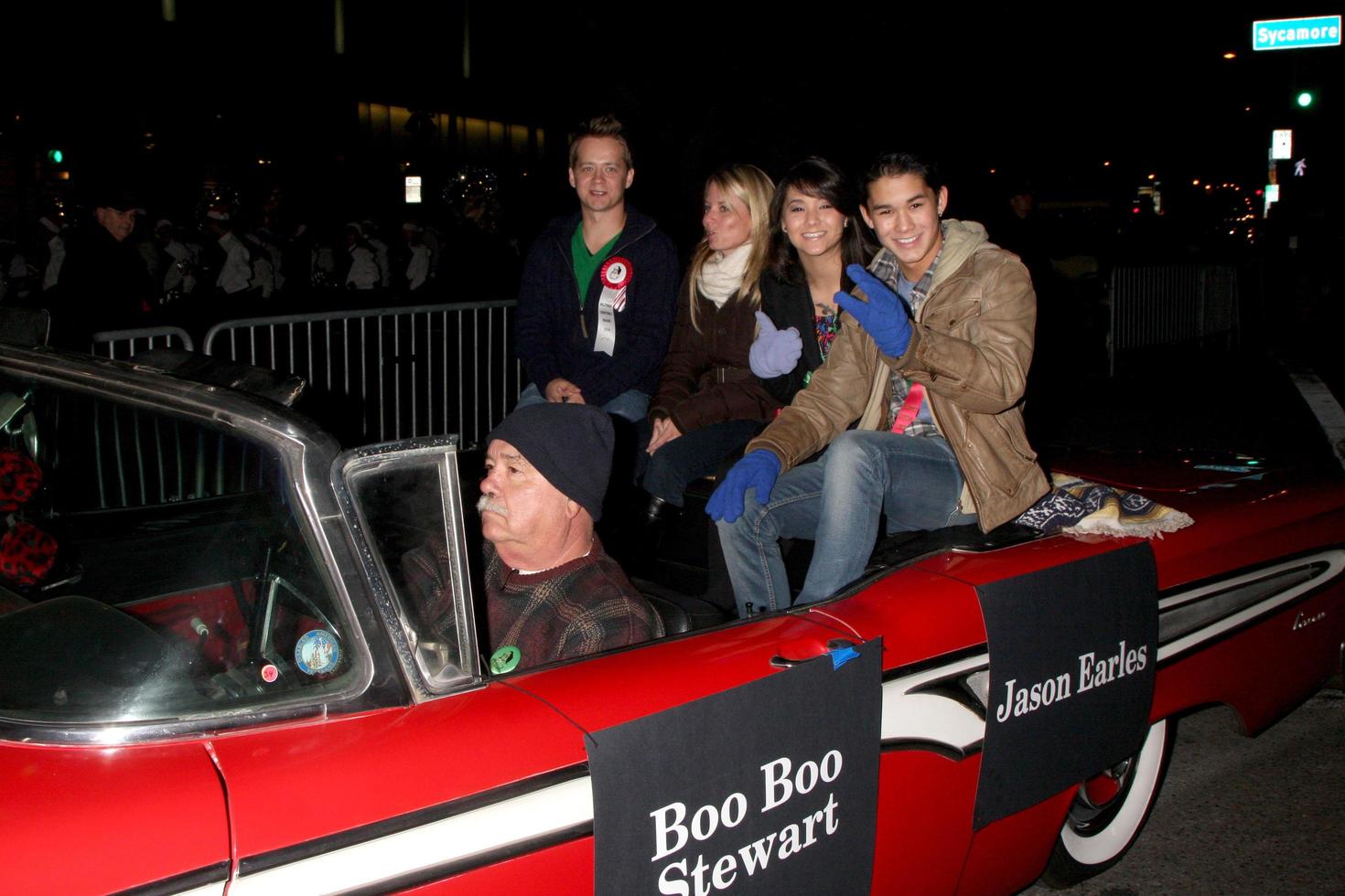 LOS ANGELES, NOV 28 -  Jason Earles, Guest, Fivel Stewart, BooBoo Stewart arrives at the 2010 Hollywood Christmas Parade at Hollywood Boulevard on November 28, 2010 in Los Angeles, CA photo