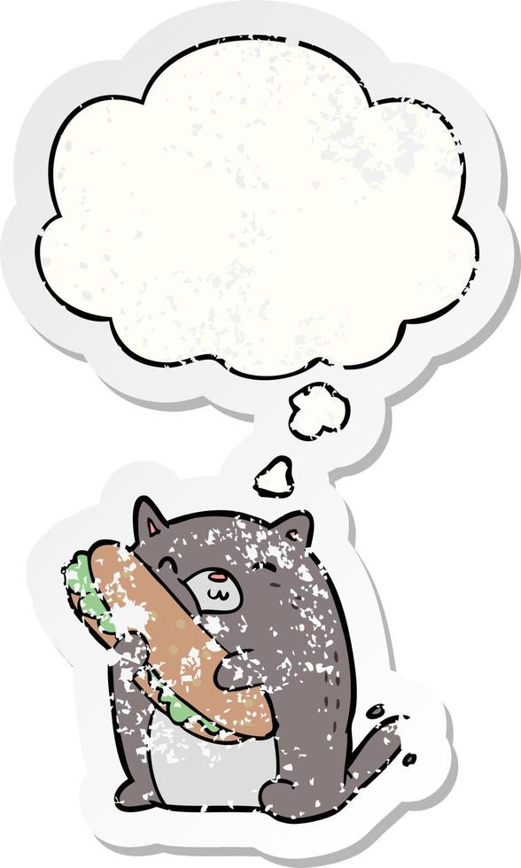 cartoon cat with sandwich and thought bubble as a distressed worn sticker vector