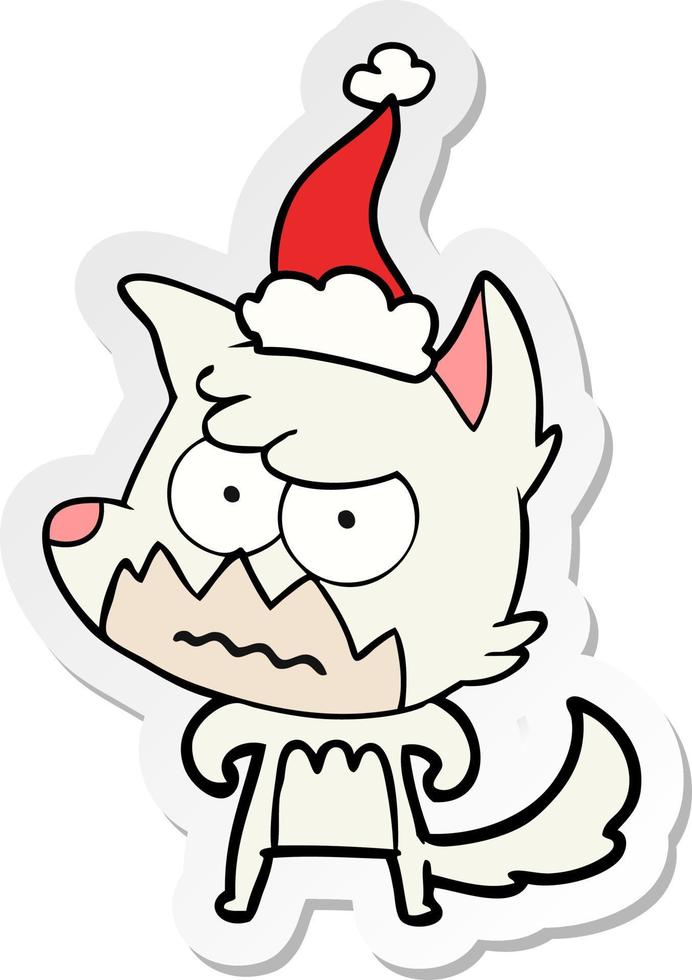 sticker cartoon of a annoyed fox wearing santa hat vector