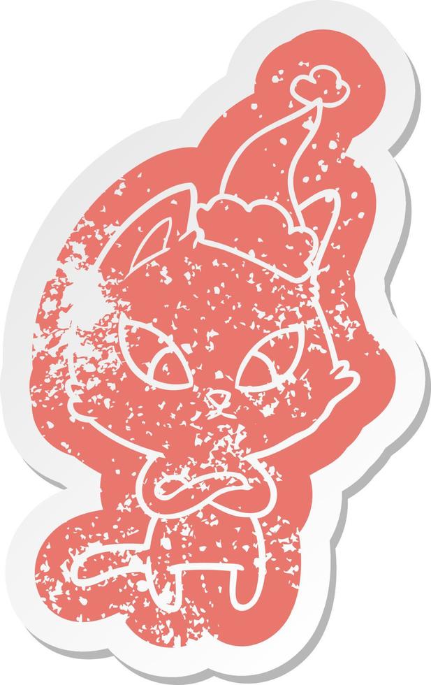 confused cartoon distressed sticker of a cat wearing santa hat vector